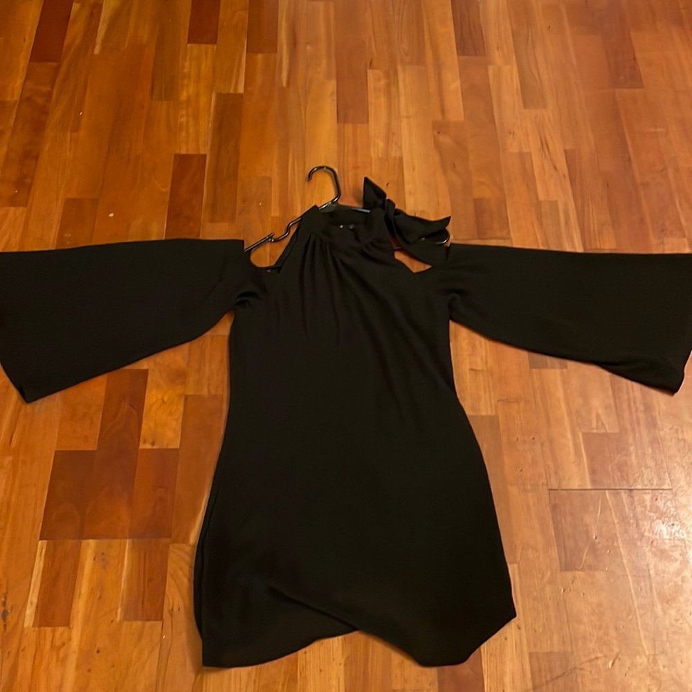 “Want and Need” (Nordstrom) black party dress.